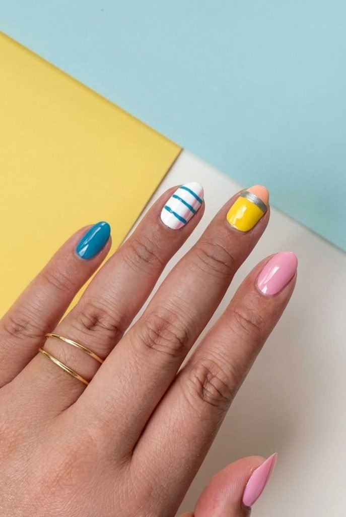 simple back to school nails in pastel color block design