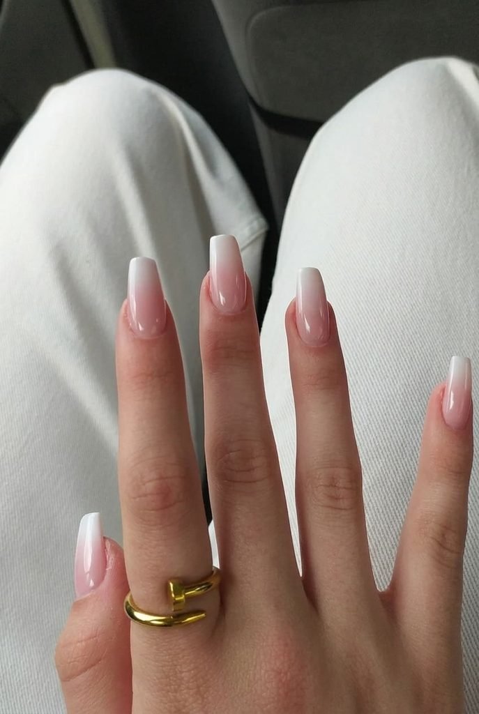 simple back to school nails with classic white French tip design